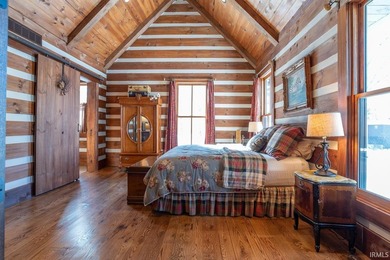 This one-of-a-kind custom log home, built in 2015, blends luxury - photo 23