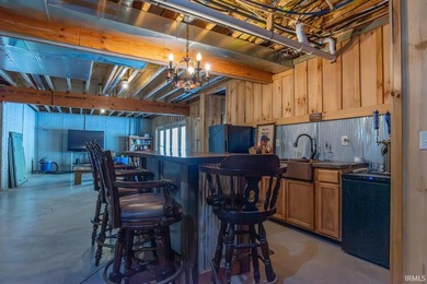 This one-of-a-kind custom log home, built in 2015, blends luxury - photo 30