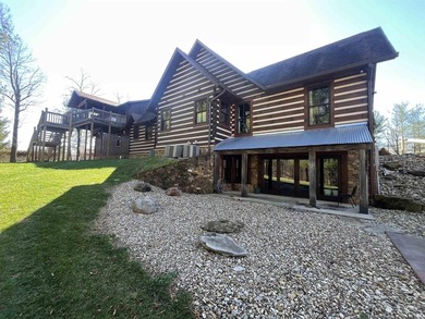 This one-of-a-kind custom log home, built in 2015, blends luxury - photo 45