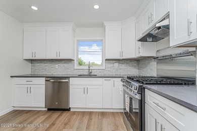 Extensively upgraded two-family detached house in the heart of - photo 15