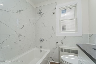 Extensively upgraded two-family detached house in the heart of - photo 17