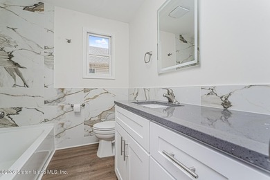 Extensively upgraded two-family detached house in the heart of - photo 34
