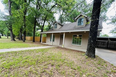 Recently renovated and move-in ready, this charming home sits on - photo 1