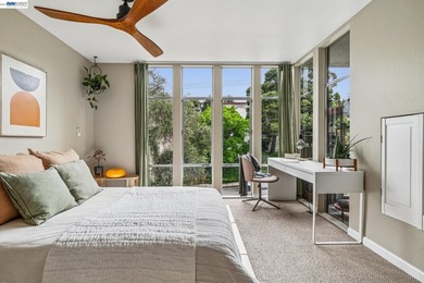 Perched on the top floor, this bright and stylishly upgraded - photo 3