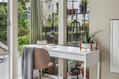Perched on the top floor, this bright and stylishly upgraded - photo 6