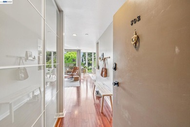 Perched on the top floor, this bright and stylishly upgraded - photo 7