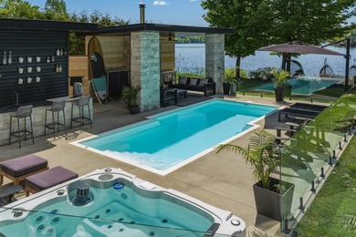Bordee par les rives du lac Connelly, cette propriete - photo 3