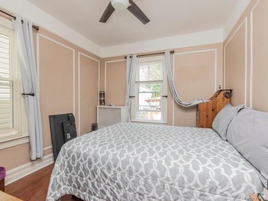 This welcoming THROGS NECK bungalow charmer is set on a quiet - photo 13