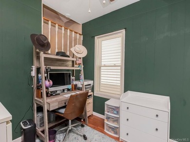 This welcoming THROGS NECK bungalow charmer is set on a quiet - photo 19