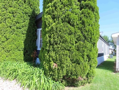 Welcome home! This well-maintained 1990 manufactured home offers - photo 2