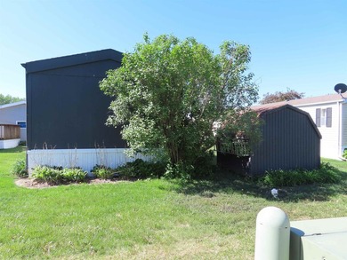 Welcome home! This well-maintained 1990 manufactured home offers - photo 5