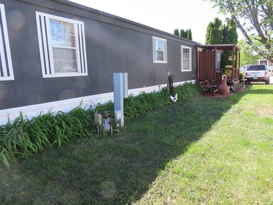 Welcome home! This well-maintained 1990 manufactured home offers - photo 7