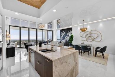 Commanding the 20th floor of the iconic Water Club Condominium - photo 12