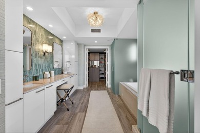 Commanding the 20th floor of the iconic Water Club Condominium - photo 25