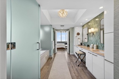 Commanding the 20th floor of the iconic Water Club Condominium - photo 29