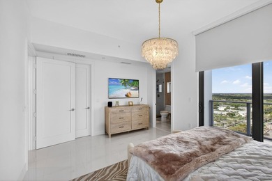 Commanding the 20th floor of the iconic Water Club Condominium - photo 35