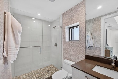 Commanding the 20th floor of the iconic Water Club Condominium - photo 37