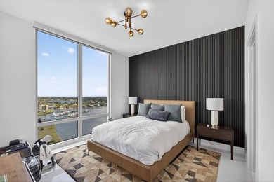 Commanding the 20th floor of the iconic Water Club Condominium - photo 42