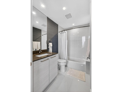 Commanding the 20th floor of the iconic Water Club Condominium - photo 44