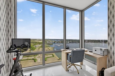 Commanding the 20th floor of the iconic Water Club Condominium - photo 50
