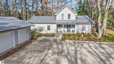 Lake Home For Sale in Rapid City, Michigan