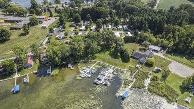 Pretty Lakefront anything is great, but this piece of property - Lake Commercial For Sale in Wolcottville, Indiana