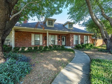 Nestled on over a third of an acre in a quiet cul-de-sac, this - photo 1