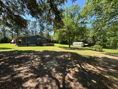 Charming 2-bedroom, 2-bath home on 1.55 unrestricted acres near - photo 12