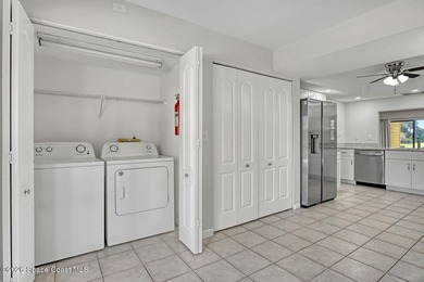 RIVERFRONT LIVING AT ITS FINEST! This stunning ground floor - photo 16