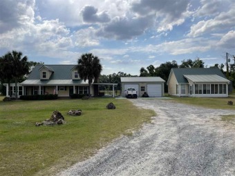 Lake Home Off Market in Malone, Florida