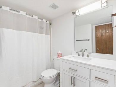 Enjoy bright mornings in this beautifully updated east-facing - photo 11