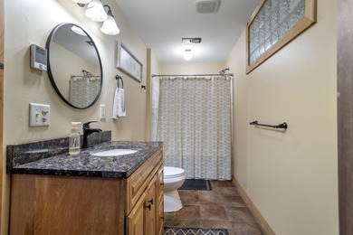 Tucked off the road on 4 peaceful acres, this 2005 custom ranch - photo 32