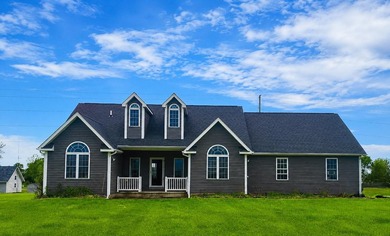 Tucked off the road on 4 peaceful acres, this 2005 custom ranch - photo 38