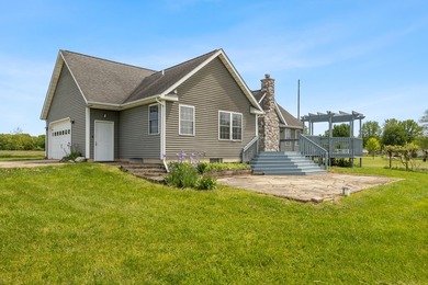 Tucked off the road on 4 peaceful acres, this 2005 custom ranch - photo 40