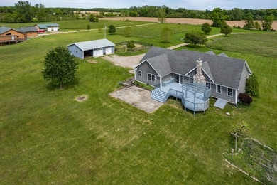 Tucked off the road on 4 peaceful acres, this 2005 custom ranch - photo 43