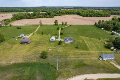Tucked off the road on 4 peaceful acres, this 2005 custom ranch - photo 45