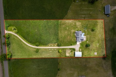 Tucked off the road on 4 peaceful acres, this 2005 custom ranch - photo 46