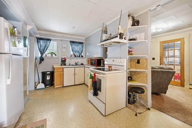 Hidden Gem with Expansive Lot & Detached Two-Bay Garage!