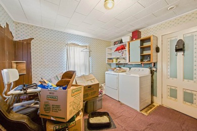 Hidden Gem with Expansive Lot & Detached Two-Bay Garage!