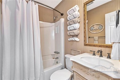 This beautifully renovated condo features luxury plank flooring - photo 11