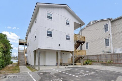 Completely gutted and renovated waterfront Banks Channel condo - photo 2