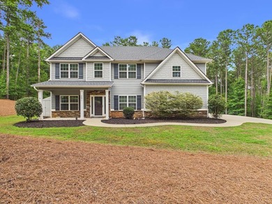 Set on over two private, wooded acres, this beautifully updated - photo 1