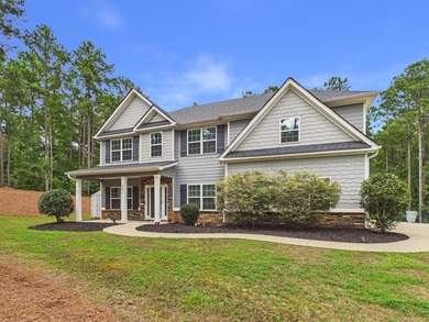 Set on over two private, wooded acres, this beautifully updated - photo 3