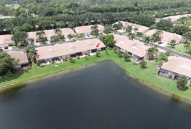 This beautifully updated lakefront villa blends timeless comfort - photo 9