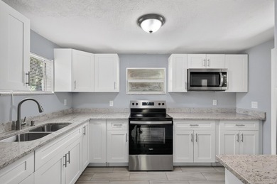 Nicely renovated 3-bedroom, 2-bath CBS home situated on a - photo 16