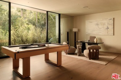 Set at the end of a private cul-de-sac in the Hollywood Hills - photo 8