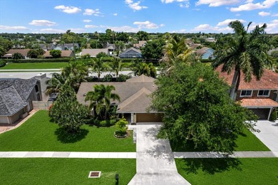 Beautifully updated 4BR/2BA pool home located in the highly - photo 2