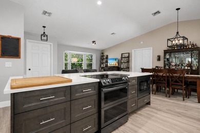 Beautifully updated 4BR/2BA pool home located in the highly - photo 9