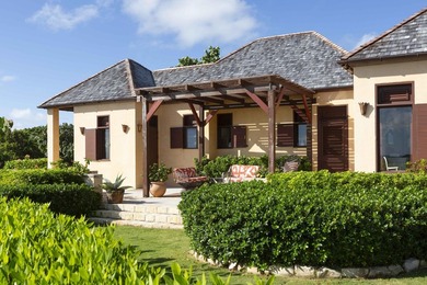 Perched 150 feet above sea level, Pelican Ridge emerges as one - photo 48