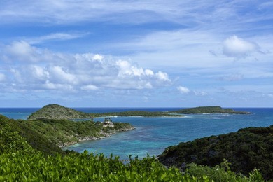 Perched 150 feet above sea level, Pelican Ridge emerges as one - photo 49